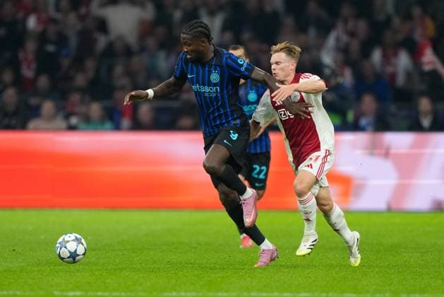 AMSTERDAM, 23-08-2025, Johan Cruijff ArenA ,season 2025 2026 , UEFA Champions League football , league phase, .Match between Ajax and Inter Milan , Picture shows Inter player Marcus Thuram, Ajax player Oliver Edvardsen Ajax - Inter  x31066337x Copyright: