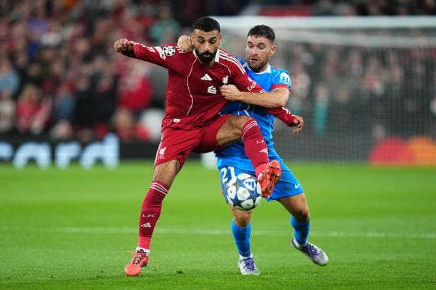 250917 Mohammed Salah of Liverpool and Javier Galan of Atletico Madrid during the Champions League football match between Liverpool and Atletico Madrid on September 17, 2025 in Liverpool Photo Bagu Blanco BILDBYRAN kod XY XY0075 fotboll football soccer fotball uefa champions league champions league liverpool atletico madrid bbeng  Copyright: BAGUxBLANCO BB250917ZP031
