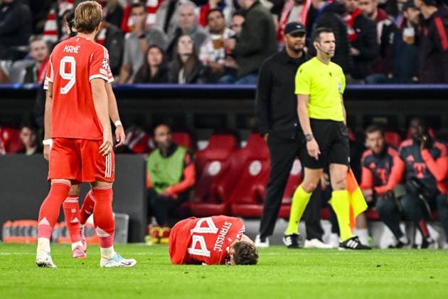 Josip Staniöic Bayern Munich injured on the ground during the UEFA Champions League 2025 26 League Phase MD1 match between FC Bayern Munich and Chelsea FC at Football Arena Munich on September 17, 2025 in Munich, Germany Photo by Harry Langer DeFodi Images