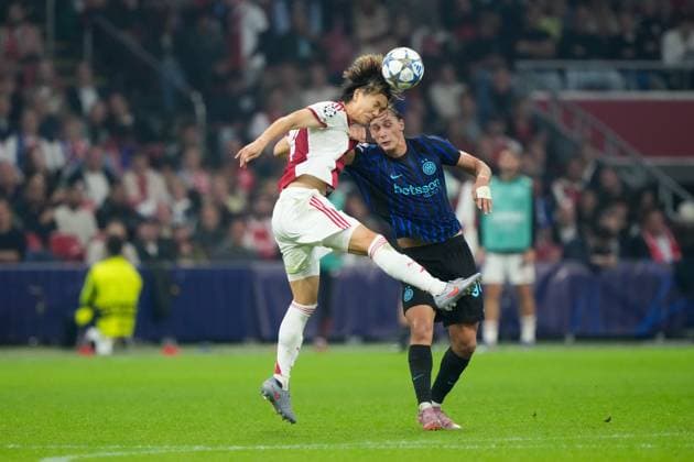 AMSTERDAM, 17-09-2025, Johan Cruijff ArenA ,season 2025 2026 , UEFA Champions League football , league phase, .Match between Ajax and Inter Milan , Picture shows Ajax player Ko Itakura , Inter player Pio Esposito Ajax - Inter  x31067499x Copyright: