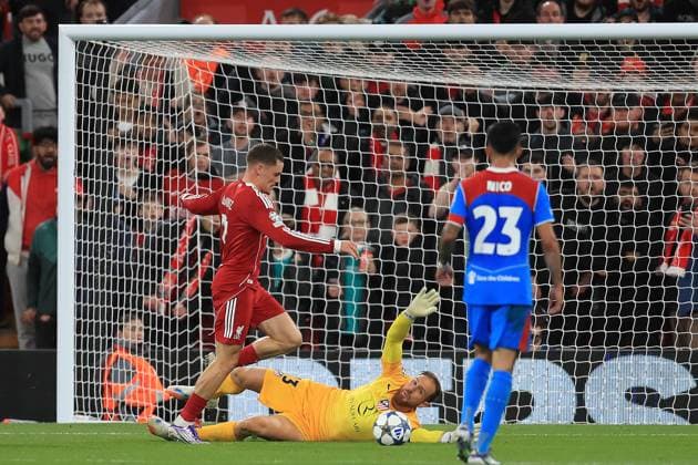 17th September 2025; Anfield, Liverpool, Merseyside, England; UEFA Champions League Football, Liverpool versus Atletico Madrid; Atletico Madrid goalkeeper Jan Oblak saves at the feet of Florian Wirtz of Liverpool  DavidxBlunsden