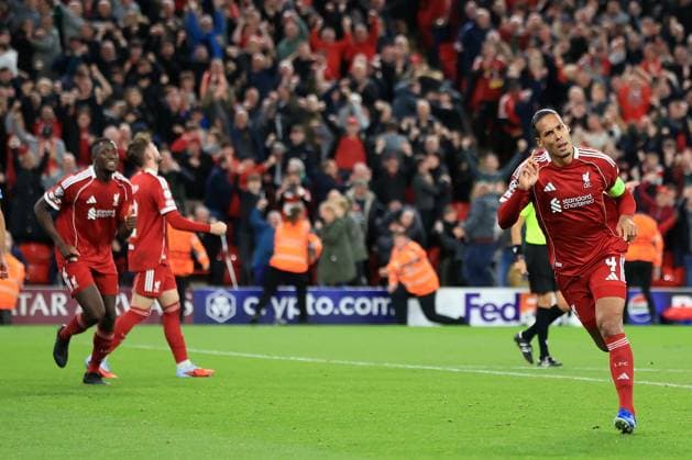 17th September 2025; Anfield, Liverpool, Merseyside, England; UEFA Champions League Football, Liverpool versus Atletico Madrid; Virgil van Dijk of Liverpool celebrates after scoring with a header for 3-2 after 2 minutes of added time  DavidxBlunsden