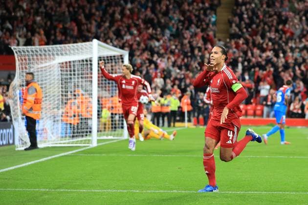 17th September 2025; Anfield, Liverpool, Merseyside, England; UEFA Champions League Football, Liverpool versus Atletico Madrid; Virgil van Dijk of Liverpool celebrates after scoring with a header for 3-2 after 2 minutes of added time  DavidxBlunsden