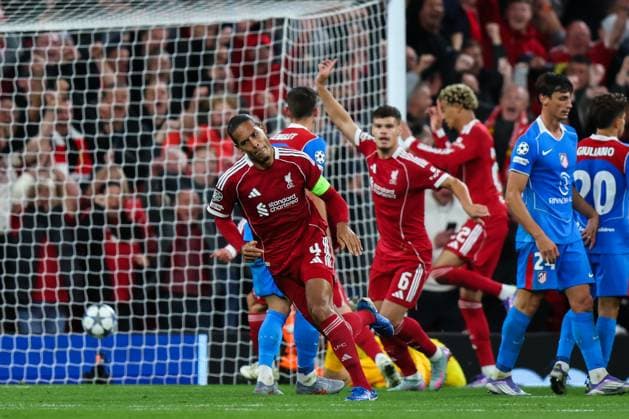 Liverpool, England, 17th September 2025. Virgil van Dijk of Liverpool celebrates his goal to make it 3-2 during the Liverpool vs Atletico Madrid UEFA Champions League match at Anfield, Liverpool. Picture credit should read: James Baylis Sportimage EDITORIAL USE ONLY. No use with unauthorised audio, video, data, fixture lists, club league logos or live services. Online in-match use limited to 120 images, no video emulation. No use in betting, games or single club league player publications. SPI_082_JB_LIV_ATM SPI-4140-0082