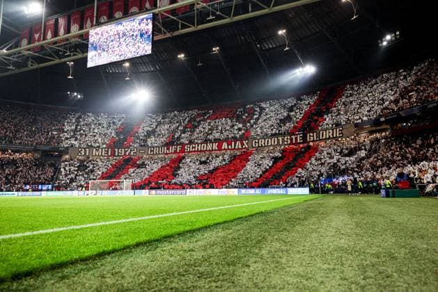 2025-09-17 AFC Ajax v FC Internazionale Milano - UEFA Champions League 2025 26 League Phase AMSTERDAM, NETHERLANDS - SEPTEMBER 17: fans of AFC Ajax with a tifo during the UEFA Champions League 2025 26 League Phase match between AFC Ajax and FC Internazionale Milano at Johan Cruijff ArenA on September 17, 2025 in Amsterdam, Netherlands. Amsterdam Johan Cruijff ArenA Netherlands Content not available for redistribution in The Netherlands directly or indirectly through any third parties. Copyright: xBenxGalx