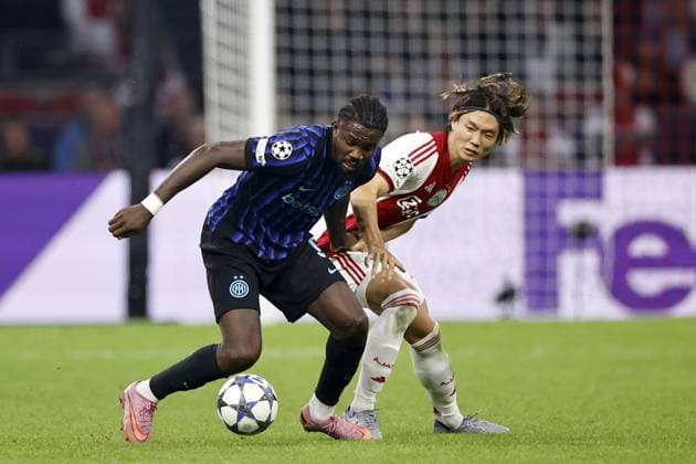 AMSTERDAM - (l-r) Marcus Thuram of FC Internazionale Milano, Ko Itakura of Ajax during the UEFA Champions League match between AFC Ajax v FC Internazionale Milano at the Johan Cruijff ArenA on September 17, 2025 in Amsterdam, Netherlands. ANP Hollandse Hoogte Maurice van Steen UEFA Champions League 2025 26 xVIxANPxSportx xMauricexvanxSteenxIVx 536662782 originalFilename: 536662782.jpg