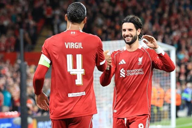 17th September 2025; Anfield, Liverpool, Merseyside, England; UEFA Champions League Football, Liverpool versus Atletico Madrid; Virgil van Dijk of Liverpool celebrates after scoring with a header for 3-2 after 2 minutes of added time  DavidxBlunsden