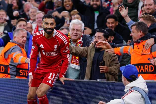 September 17, 2025, Liverpool, Liverpool, England: Mohamed Salah of Liverpool FC celebrates a goal during the UEFA Champions League 2025 26 League Phase MD1 match between Liverpool FC and Atletico de Madrid at Anfield on September 17, 2025, in Liverpool, England. Liverpool England - ZUMAa181 20250917_zaa_a181_070 Copyright: xDennisxAgyemanx