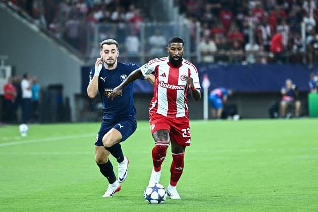 September 17, 2025, Piraeus, Piraeus, Greece: 23 RODINEI of Olympiacos competes with 30 VLAD DRAGOMIR of Paphos FC during the UEFA Champions League, League Phase, Matchday 1 game between Olympiacos and Paphos FC at Georgios Karaiskakis Stadium on September 17, 2025, in Piraeus, Greece. Piraeus Greece - ZUMAk160 20250917_zip_k160_013 Copyright: xStefanosxKyriazisx