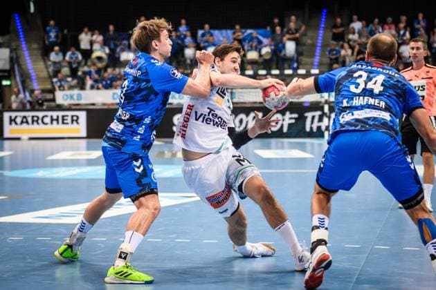 Ludvig Hallbaeck Frisch Auf Goeppingen, 20 is stopped by Max Haefner TVB Stuttgart, 03 , re Kai Haefner TVB Stuttgart, 34 GER, TVB 1898 Stuttgart Frisch Auf Goeppingen, DAIKIN HBL, Handball, Bundesliga, 5 Spieltag, Spielzeit 2025 2026, 18 09 2025 GER, TVB 1898 Stuttgart Frisch Auf Goeppingen, DAIKIN HBL, Handball, Bundesliga, 5 Spieltag, Spielzeit 2025 2026, 18 09 2025 Stuttgart Copyright: xSandyxDinkelackerx EP_SDR