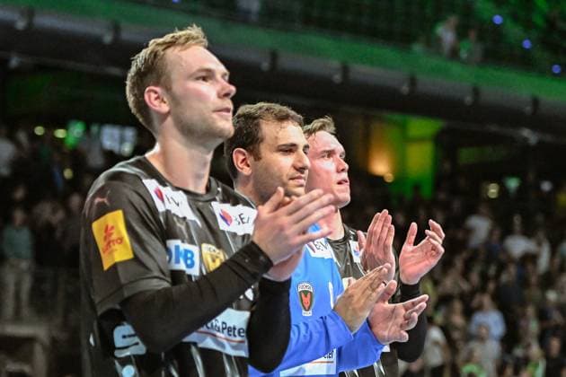 18 09 2025, xlakx, Handball, EHF Champions League, Fuechse Berlin Aalborg Handbold f l Mathias Gidsel Fuechse Berlin , Dejan Milosavljev Fuechse Berlin , Lasse Andersson Fuechse Berlin Celebrating the victory, cheering after the match Berlin Daniel Lakomski