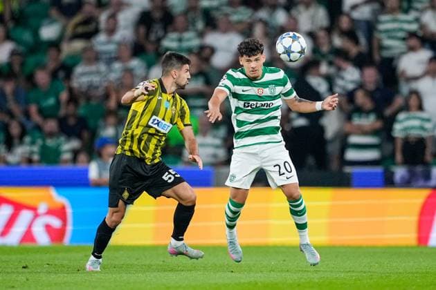 UEFA CHAMPIONS LEAGUE SPORTING CP VS KAIRAT ALMATY Lisboa, Portugal - 18 09 2025: UEFA Champions League match between Sporting CP and Kairat Almaty at Estadio JosÃ Alvalade 20 Sporting defender, Maximiliano Araujo in a duell with 55 Kairat Almaty midfielder, Valeri Gromyko Mandatory Credit: Pedro Loureiro Avant Sports Agency Lisboa Estadio JosÃ Alvalade Portugal Copyright: xx