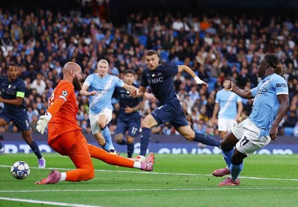 Jeremy Doku of Manchester City scores a goal to make it 2-0 Manchester City v Napoli, UEFA Champions League, Group Stage, Football, Etihad Stadium, Manchester, UK - 18 Sep 2025Manchester Etihad Stadium United Kingdom EDITORIAL USE ONLY No use with unauthorised audio, video, data, fixture lists, club league logos or live services. Online in-match use limited to 120 images, no video emulation. No use in betting, games or single club league player publications. Copyright: xMattxWest Shutterstockx 15486943at