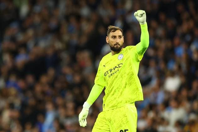 September 18, 2025, Manchester, Naples, England: Gianluigi Donnarumma of Manchester City celebrates after Jero my Doku of Manchester City scoring their second gol during the UEFA Champions League 2025 26 League Phase MD1 match between Manchester City and SSC Napoli at Etihad Stadium on September 18, 2025 in Manchester, England Manchester England - ZUMAl131 20250918_zsp_l131_036 Copyright: xCiroxDexLucax