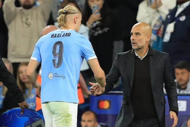 18th September 2025; Etihad Stadium, Manchester, England; UEFA Champions League Football, Manchester City versus Napoli; Manchester City manager Pep Guardiola shakes hands with Erling Haaland as he is substituted  DavidxBlunsden