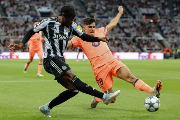 18th September 2025; St James Park, Newcastle, England; UEFA Champions League Football, Newcastle United versus Barcelona; Gerard Martin of Barcelona blocks a cross from Anthony Elanga of Newcastle United  CraigxCowan