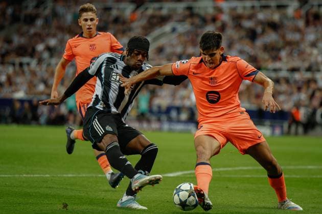 18th September 2025; St James Park, Newcastle, England; UEFA Champions League Football, Newcastle United versus Barcelona; Gerard Martin of Barcelona blocks the cross of Anthony Elanga of Newcastle United  CraigxCowan