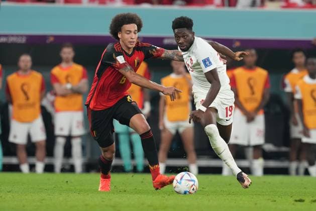 Belgium v Canada: Group F - FIFA World Cup, WM, Weltmeisterschaft, Fussball Qatar 2022 AL-RAYYAN, QATAR - NOVEMBER 23: Axel Witsel (L) of Belgium in action against Alphonso Davies of Canada during the Qatar 2022 World Cup Group F football match between Belgium and Canada at the Ahmad Bin Ali Stadium in Al-Rayyan, west of Doha on November 23, 2022. Ar Rayyan Qatar. Editorial use only. Please get in touch for any other usage.  Copyright: x2025xAnadoluxSerhatxÃ‡aÄüdaÅüx