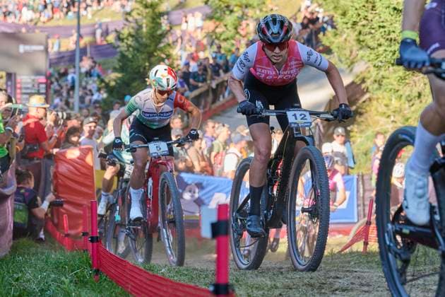 2025 WHOOP UCI Mountain Bike World Series XCC World Cup Women Elite, Lenzerheide, Switzerland Lenzerheide, Switzerland September 19, 2025 Candice Lill and Jolanda Neff Cannondale Factory Racing during the Womens Elite Cross Country Short Track at the 2025 WHOOP UCI Mountain Bike World Series in Lenzerheide