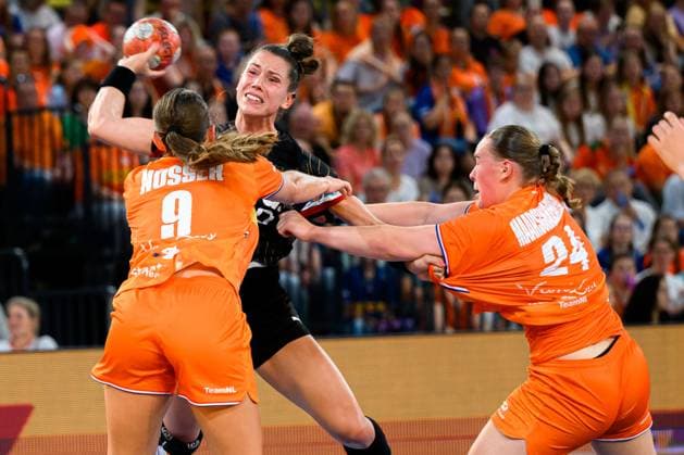 Eindhoven handball womens national match Netherlands Germany from left in duel Larissa Nuesser Nüsser Netherlands , Emily Vogel Germany , Romee Maarschalkeweerd Netherlands Eindhoven Netherlands