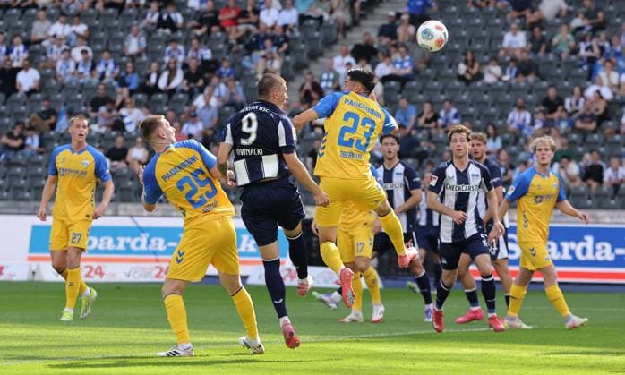 Tjark Scheller, Dawid Kownacki, Raphael Obermair duel match scene Action Sport Soccer Football DFL 2 Bundesliga Men 6 Matchday Season 2025 2026 20 09 2025 Hertha BSC Berlin vs SC Paderborn SCP DFL regulations prohibit any use of photographs as image sequences and or quasi video