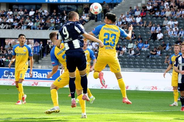 DEU, DFL, 2 FBL, Hertha BSC vs Paderborn, 20 09 2025, Berliner Olympiastadion, Berlin, DEU, DFL, 2 FBL, Hertha BSC vs Paderborn, pictured Dawid Kownacki Hertha BSC Berlin 9 , Maximillian Thalhammer SC Paderborn 23 , Tjark Scheller SC Paderborn 25 DFL regulations prohibit any use of Photographs as image sequences and or quasi video nordphotoxGmbHx xEngler nph00076