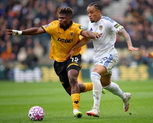 Wolverhampton Wanderers v Leeds United - Premier League Emmanuel Agbadou of Wolverhampton Wanderers and Noah Okafor of Leeds United challenge during the Premier League match between Wolverhampton Wanderers and Leeds United at Molineux on September 20, 2025 in Wolverhampton, England. Wolverhampton Molineux England United Kingdom Copyright: xEdxSykes Sportsphoto APLx 14135337