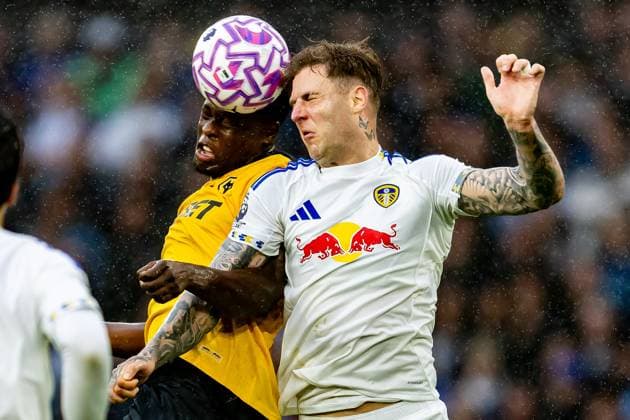 Wolverhampton Wanderers v Leeds United Premier League 20 09 2025. Wolverhampton Wanderers midfielder Marshall Munetsi (5) and Leeds United defender Joe Rodon (6) heads the ball during the Premier League match between Wolverhampton Wanderers and Leeds United at Molineux, Wolverhampton, England on 20 September 2025. Wolverhampton Molineux West Midlands England Editorial use only DataCo restrictions apply See www.football-dataco.com , Copyright: xManjitxNarotrax PSI-22857-0043