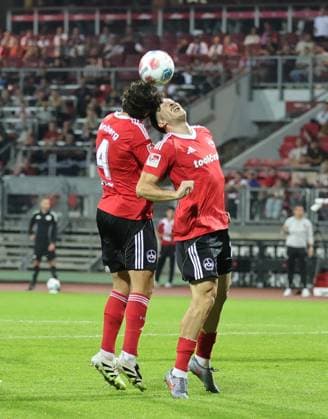 20 09 2025 Soccer Season 2025 2026 2 Soccer Bundesliga 06 Matchday 1 FC Nürnberg FCN Club VfL Bochum Sportfoto Zink DaMa xdaxmax DFL regulations prohibit any use of photographs as image sequences and or quasi video only for editorial use Fabio Gruber 4, 1 FC Nürnberg FCN Luka Lochoshvili 24, 1 FC Nürnberg FCN clear by header