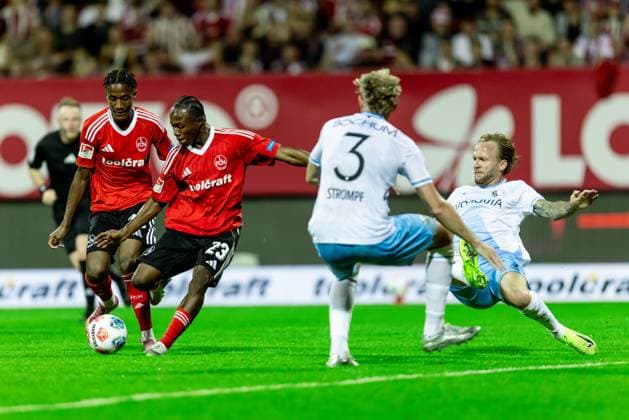 Football, Season 2025 2026, 2 Bundesliga, Max Morlock Stadion, Matchday 6, 1 FC Nürnberg VfL Bochum, 20 09 2025 20 09 2025, Football, Season 2025 2026, 2 Bundesliga, Max Morlock Stadion, Matchday 6, 1 FC Nürnberg VfL Bochum, v l 20 Pape Demba Diop 1 FC Nürnberg , 23 Mohamed Ali Zoma 1 FC Nürnberg , 7 Kevin Vogt VfL Bochum Foto Lucca Fundel Nürnberg Max Morlock Stadion Bayern Germany
