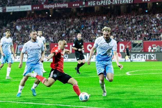 Football, Season 2025 2026, 2 Bundesliga, Max Morlock Stadion, Matchday 6, 1 FC Nürnberg VfL Bochum, 20 09 2025 20 09 2025, Football, Season 2025 2026, 2 Bundesliga, Max Morlock Stadion, Matchday 6, 1 FC Nürnberg VfL Bochum, f l 10 Julian Justvan 1 FC Nürnberg , 3 Philipp Strompf VfL Bochum Photo Lucca Fundel Nürnberg Max Morlock Stadion Bayern Germany