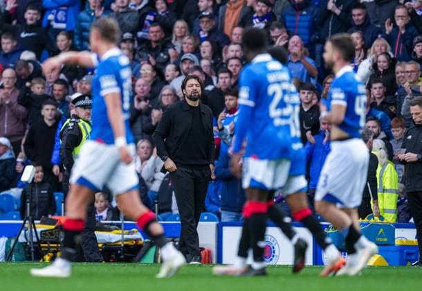 Rangers Manager Russell Martin looks towards his players while Nicolas Raskin of Rangers celebrates with team mates after scoring to give Rangers a 1-0 lead. Rangers v Hibernian, Premier Sports Cup, Quarter Final, Football, Ibrox Stadium, Glasgow, Scotland, UK - 20 Sep 2025Glasgow Ibrox Stadium United Kingdom EDITORIAL USE ONLY No use with unauthorised audio, video, data, fixture lists, club league logos or live services. Online in-match use limited to 120 images, no video emulation. No use in betting, games or single club league player publications. Copyright: xStuartxWallace Shutterstockx 15487048de