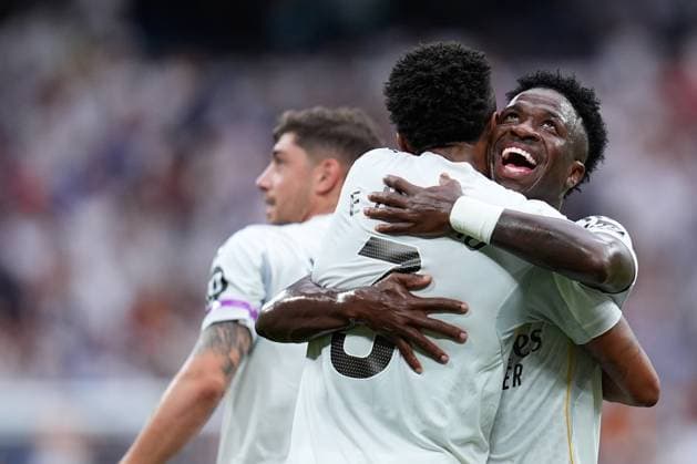 September 20, 2025, Madrid, Madrid, Spain: Eder Militao of Real Madrid CF celebrates a goal with Vinicius Junior of Real Madrid CF during the Spanish League, LaLiga EA Sports, football match played between Real Madrid and RCD Espanyol at Santiago Bernabeu stadium on September 20, 2025, in Madrid, Spain. Madrid Spain - ZUMAa181 20250920_zaa_a181_144 Copyright: xDennisxAgyemanx