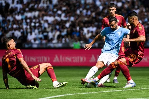 Lorenzo Pellegrini of AS Roma, Pedro Eliezer Rodriguez Ledesma of SS Lazio and Zeki Celik of AS Roma during the Serie A 2025 2026 football match between SS Laziio and AS Roma at Stadio Olimpico in Roma (Italy), September 21, 2025. andreaxstaccioli