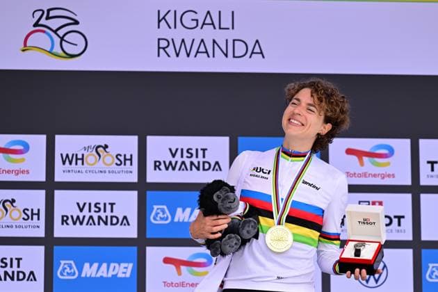 Swiss Marlen Reusser celebrates on the podium after winning the Women Elite Individual Time Trial race (31,2km) at the road world championships, in Kigali, Rwanda, Sunday 21 September 2025. The 2025 UCI Road World Championships take place from 21 to 28 September in Kigali, Rwanda. DIRKxWAEM  x134891387x