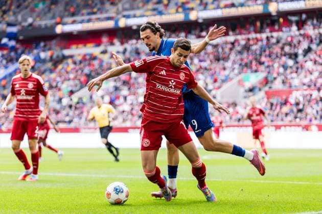 2 Soccer Bundesliga Fortuna Düsseldorf 1895 SV Darmstadt 98 21 09 2025 duel Tim Oberdorf Fortuna Düsseldorf, 15 , Fraser Hornby SV Darmstadt 98, 9 2 Soccer Bundesliga, Fortuna Düsseldorf 1895 SV Darmstadt 98 Düsseldorf, Merkur Spiel Arena on 21 09 2025 DFL REGULATIONS PROHIBIT ANY USE OF PHOTOGRAPHS AS IMAGE SEQUENCES AND OR QUASI VIDEO Copyright: xBEAUTIFULxSPORTS Wunderlx
