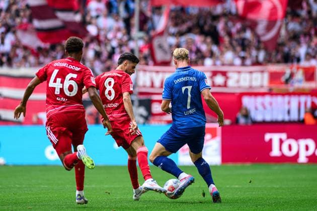 DUSSELDORF, GERMANY - 21 SEPTEMBER, 2025: Sima Suso, Anouar El Azzouzi, Isac Lidberg - Football match Bundesliga 2 Fortuna Düsseldorf - SV Darmstadt 98 at Merkur Spiel Arena.  Copyright: xVITALIIxKLIUIEVx