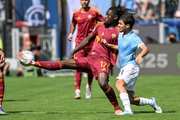 Manu Kone of AS Roma and Reda Belahyane of SS Lazio compete for the ball during the Serie A 2025 2026 football match between SS Laziio and AS Roma at Stadio Olimpico in Roma (Italy), September 21, 2025. andreaxstaccioli