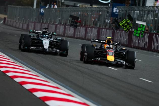 F1 - AZERBAIJAN GRAND PRIX 2025 22 TSUNODA Yuki (jap), Red Bull Racing RB21, action 63 RUSSELL George (gbr), Mercedes AMG F1 Team W16, action during the 2025 Formula 1 Qatar Airways Azerbaijan Grand Prix, 17th round of the 2025 FIA Formula One World Championship, WM, Weltmeisterschaft from September 19 to 21, 2025 on the Baku City Circuit, in Baku, Azerbaijan - Copyright: xANTONINxVINCENTx