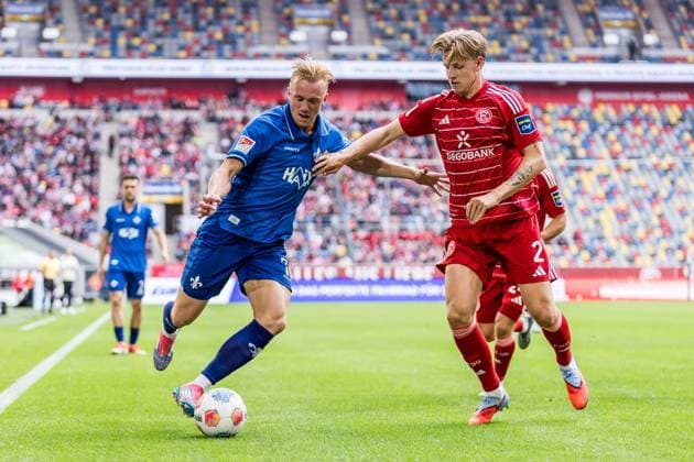 2 Soccer Bundesliga Fortuna Düsseldorf 1895 SV Darmstadt 98 21 09 2025 duel Isac Alexi Sivert Lidberg SV Darmstadt 98, 7 , Jesper Daland Fortuna Düsseldorf, 2 2 Soccer Bundesliga, Fortuna Düsseldorf 1895 SV Darmstadt 98 Düsseldorf, Merkur Spiel Arena on 21 09 2025 DFL REGULATIONS PROHIBIT ANY USE OF PHOTOGRAPHS AS IMAGE SEQUENCES AND OR QUASI VIDEO Copyright: xBEAUTIFULxSPORTS Wunderlx