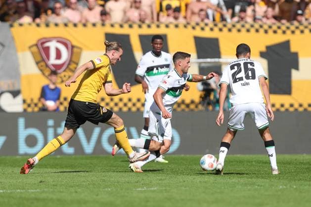 21 09 2025, xtgx, Fußball 2 Bundesliga Dynamo Dresden Hannover 96 emspor, v l Vinko Sapina Dresden, 5 , Benedikt Pichler Hannover, 11 Zweikampf, Duell, Kampf, tackle DFL DFB REGULATIONS PROHIBIT ANY USE OF PHOTOGRAPHS as IMAGE SEQUENCES and or QUASI VIDEO Dresden