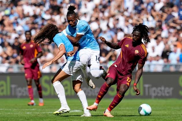 Matteo Guendouzi (SS Lazio), Tijjani Noslin (SS Lazio) and Manu Kone (AS Roma) battle for the ball, Serie A, SS Lazio v AS Roma, Olimpico Stadium, September 21, 2025, Roma, Italy.