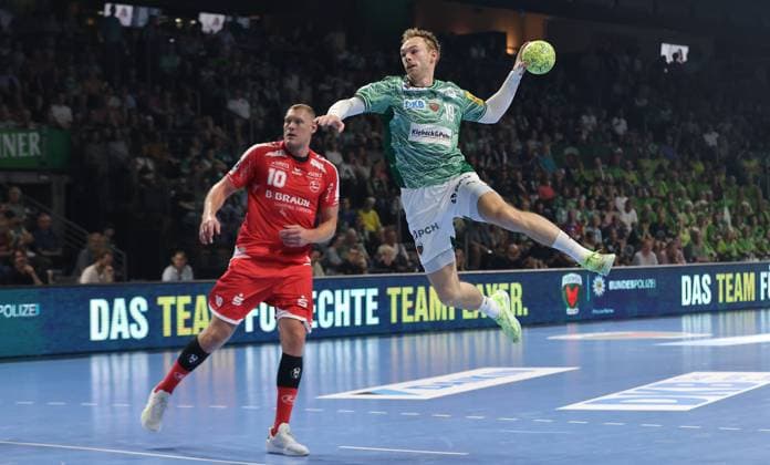 Dainis Kristopans, Mathias Gidsel scores a goal duel Match scene Action Sport Handball HBL Bundesliga Men 5 Matchday Season 2025 2026 21 09 2025 Füchse Berlin vs MT Melsungen