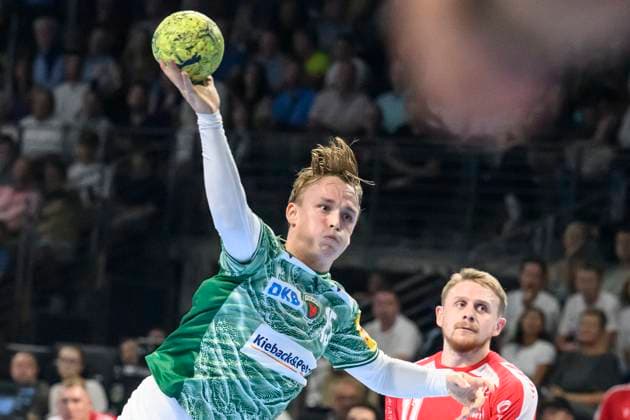 in the picture from l Tobias Grondahl Fuechse Berlin , GER, Berlin, Handball, Fuechse Berlin vs MT Melsungen, DAIKIN Handball Bundesliga, in the Max Schmeling Halle, 21 09 2025, Copyright: HMBxMedia UwexKoch