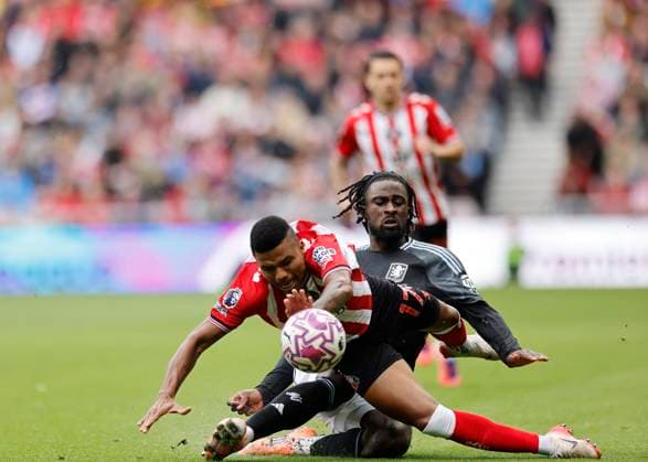 Sunderland v Aston Villa Premier League Evann Guessand of Aston Villa competes for the ball with Reinildo Mandava of Sunderland during the Premier League match at the Stadium Of Light, Sunderland UK Newspapers OUT Copyright: xFredxPalmerx FIL-22264-0062