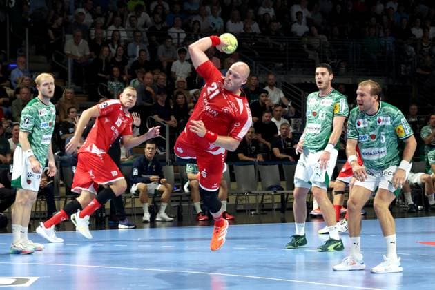 DEU, DHB, 1 HBL, Fuechse Berlin vs Melsungen, 21 09 2025, Max Schmeling Halle, Berlin, DEU, DHB, 1 HBL, Fuechse Berlin vs Melsungen, in the picture Max Darj Fuechse Berlin 5 , Mijajlo Marsenic Fuechse Berlin 93 , Arnar Freyr Arnarsson MT Melsungen 21 nordphotoxGmbHx xEngler nph00076
