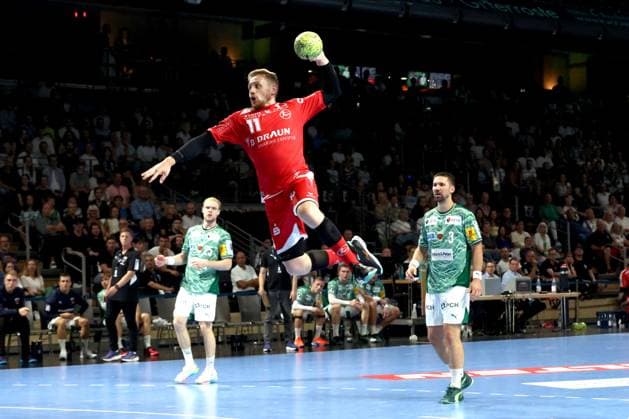 DEU, DHB, 1 HBL, Fuechse Berlin vs Melsungen, 21 09 2025, Max Schmeling Halle, Berlin, DEU, DHB, 1 HBL, Fuechse Berlin vs Melsungen, pictured Matthes Langhoff Fuechse Berlin 25 , Fabian Wiede Fuechse Berlin 3 , Dimitri Ignatow MT Melsungen 11 nordphotoxGmbHx xEngler nph00076