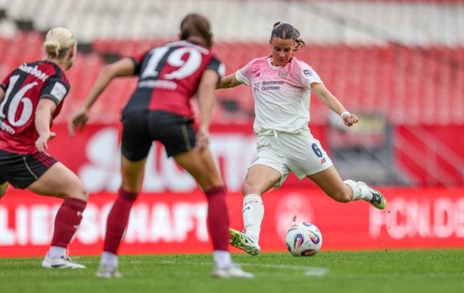 DEU, Nürnberg, FC Nürnberg vs Bayer Leverkusen, Google Pixel Bundesliga, DFB, Saison 2526, Max Morlock Stadion, 3 Spieltag, im Bild f l n r Sanja Homann Nürnberg 19 , Katharina PiljiÄ‡ Bayer Leverkusen 6 DFB DFL REGULATIONS PROHIBIT ANY USE OF PHOTOGRAPHS AS IMAGE SEQUENCES AND OR QUASI VIDEO, 21 09 2025, Copyright: HMBxMedia HendrikxHamelau