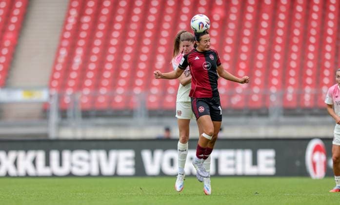 DEU, Nürnberg, FC Nürnberg vs Bayer Leverkusen, Google Pixel Bundesliga, DFB, Saison 2526, Max Morlock Stadion, 3 Spieltag, im Bild f l n r Lilla Turanyi Bayer Leverkusen 24 , Selma LiÄina Nürnberg 17 , Zweikamp DFB DFL REGULATIONS PROHIBIT ANY USE OF PHOTOGRAPHS AS IMAGE SEQUENCES AND OR QUASI VIDEO, 21 09 2025, Copyright: HMBxMedia HendrikxHamelau