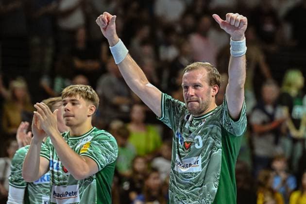21 09 2025, xlakx, Handball Daikin HBL, Fuechse Berlin MT Melsungen f l Max Guenther Fuechse Berlin , Max Darj Fuechse Berlin Cheering about the victory, cheering after the end of the game Berlin Daniel Lakomski